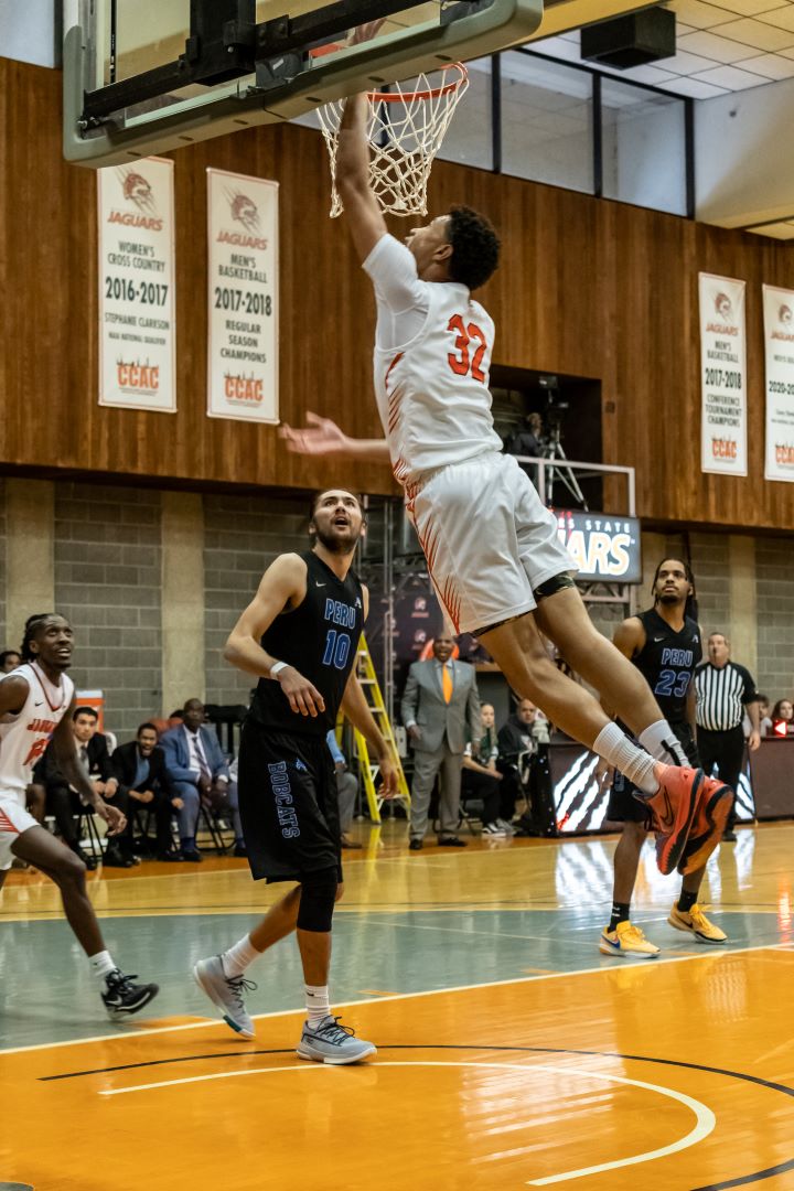 (32) Freshman Vincent Davis with a double-double, 18 points, 11 rebounds at Judson University